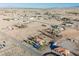 Expansive aerial view of the neighborhood with desert landscaping and mountain views at 1601 Iguana St, Pahrump, NV 89048