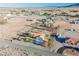 Aerial view of home showcasing large lot, mature landscaping, and community at 1601 Iguana St, Pahrump, NV 89048