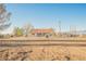 Single-story home with terracotta tile roof on a large, natural desert lot at 1601 Iguana St, Pahrump, NV 89048