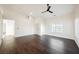 Bright living room with recessed lighting, hardwood floors, and a ceiling fan at 1601 Iguana St, Pahrump, NV 89048