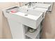 Contemporary bathroom sink with stylish fixtures and storage shelves at 2040 Bavington Dr # D, Las Vegas, NV 89108
