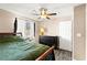 Bedroom with laminate flooring, ceiling fan and neutral paint at 2040 Bavington Dr # D, Las Vegas, NV 89108