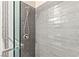 Updated shower with subway tile and modern fixtures at 2040 Bavington Dr # D, Las Vegas, NV 89108