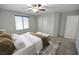 Neutral bedroom with cozy carpet, large window, and ample closet space at 2332 Mundare Dr, Henderson, NV 89002
