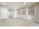 Open-concept living room with tile floors and recessed lighting at 2332 Mundare Dr, Henderson, NV 89002