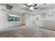 Upstairs loft features carpeted floors, a large TV, and natural lighting at 2332 Mundare Dr, Henderson, NV 89002