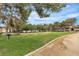 Expansive green common area with picnic tables and grills, fostering a sense of community at 2451 N Rainbow Blvd # 1066, Las Vegas, NV 89108
