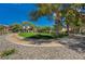 Lush common area with picnic tables and trees, ideal for outdoor gatherings and relaxation at 2451 N Rainbow Blvd # 1066, Las Vegas, NV 89108