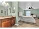 This main bedroom features wood floors and a granite countertop vanity at 2451 N Rainbow Blvd # 1066, Las Vegas, NV 89108