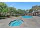 Inviting community pool and spa area, ideal for relaxation and enjoying the outdoors at 2451 N Rainbow Blvd # 1066, Las Vegas, NV 89108
