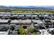 Elevated view showcasing the home's backyard, landscaping and proximity to adjacent homes in the neighborhood at 2544 Sable Ridge St, Henderson, NV 89044