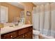 Bathroom with single vanity and shower with curtain at 2544 Sable Ridge St, Henderson, NV 89044