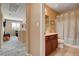 Upstairs bathroom with tile floors and shower at 2544 Sable Ridge St, Henderson, NV 89044