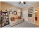 The light beige walls of this bedroom are decorated with framed images at 2544 Sable Ridge St, Henderson, NV 89044