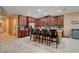 Beautiful kitchen with a large island, wood cabinets, and stainless steel appliances at 2544 Sable Ridge St, Henderson, NV 89044