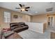 Upstairs living room with neutral walls, ceiling fan, and comfortable seating at 2544 Sable Ridge St, Henderson, NV 89044