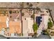 A stunning aerial view of a single-Gathering home with a well-maintained backyard and desert landscaping at 2587 Grizzly Park Ct, Henderson, NV 89052