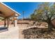 Landscaped backyard featuring rock features, a covered patio, and plenty of space at 2587 Grizzly Park Ct, Henderson, NV 89052