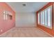 Inviting bedroom showcasing neutral carpet, fresh paint, and shuttered windows at 2587 Grizzly Park Ct, Henderson, NV 89052