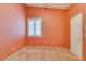 Bright bedroom featuring plantation shutters, neutral colors, and carpet, offering a peaceful atmosphere at 2587 Grizzly Park Ct, Henderson, NV 89052