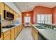 Modern kitchen featuring updated cabinetry, granite counters, and stainless appliances; perfect for culinary enthusiasts at 2587 Grizzly Park Ct, Henderson, NV 89052