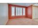 Neutral living room boasts shuttered windows, fresh paint, and ample natural light at 2587 Grizzly Park Ct, Henderson, NV 89052