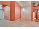 Open living area featuring tile flooring, archways, and decorative lighting at 2587 Grizzly Park Ct, Henderson, NV 89052