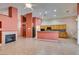 Bright open floorplan connects the living room, kitchen, and dining area at 2587 Grizzly Park Ct, Henderson, NV 89052