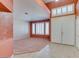 Spacious living room boasts neutral decor, carpet, and ample natural light at 2587 Grizzly Park Ct, Henderson, NV 89052