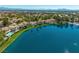 Beautiful waterfront homes line the lake in this scenic community with lush landscaping at 2736 Huber Heights Dr, Las Vegas, NV 89128