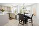 Eat-in kitchen area featuring lots of natural light, modern appliances, and neutral countertops at 2736 Huber Heights Dr, Las Vegas, NV 89128