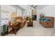 Living room with large windows, fireplace and neutral-colored walls and carpeting at 2736 Huber Heights Dr, Las Vegas, NV 89128