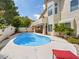 A refreshing swimming pool with ample deck space for lounging and entertaining at 2736 Huber Heights Dr, Las Vegas, NV 89128