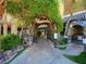 Charming restaurant entrance with beautiful greenery, signage and outdoor seating at 2736 Huber Heights Dr, Las Vegas, NV 89128