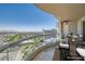 Spacious balcony with city views, outdoor seating, and modern railings at 2777 Paradise Rd # 2701, Las Vegas, NV 89109