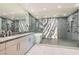 A modern bathroom with a glass-enclosed shower and soaking tub, featuring sleek fixtures and stylish design at 2777 Paradise Rd # 2701, Las Vegas, NV 89109