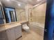 Cozy bathroom with a combination tub and shower, tile flooring, and ample natural light, providing comfort at 2777 Paradise Rd # 2701, Las Vegas, NV 89109