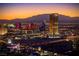 Elevated view of the Las Vegas Strip, capturing its skyline, vibrant lights, and the surrounding mountain range at 2777 Paradise Rd # 2701, Las Vegas, NV 89109