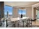 Bright dining room features city views and stylish modern lighting at 2777 Paradise Rd # 2701, Las Vegas, NV 89109