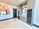 Kitchen area featuring wine refrigerators, modern cabinetry, and marble floors at 2777 Paradise Rd # 2701, Las Vegas, NV 89109