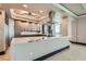 Modern kitchen with marble countertops, stainless steel appliances, and stylish overhead lighting at 2777 Paradise Rd # 2701, Las Vegas, NV 89109