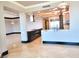 Open kitchen with marble countertops and designer lighting at 2777 Paradise Rd # 2701, Las Vegas, NV 89109