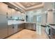 Contemporary kitchen featuring sleek cabinets, granite countertops, and stainless steel appliances at 2777 Paradise Rd # 2701, Las Vegas, NV 89109