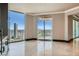 Bright living room featuring floor-to-ceiling windows and a stunning city view at 2777 Paradise Rd # 2701, Las Vegas, NV 89109