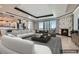 Bright, open living space with floor-to-ceiling windows and a modern fireplace, virtually staged for appeal at 2777 Paradise Rd # 2701, Las Vegas, NV 89109