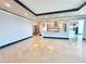 Bright living room featuring an open kitchen, marble floors, and an elegant entryway at 2777 Paradise Rd # 2701, Las Vegas, NV 89109