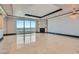 Bright living room with floor-to-ceiling windows offering city views and a cozy fireplace at 2777 Paradise Rd # 2701, Las Vegas, NV 89109