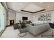Elegant living room with a marble fireplace, recessed lighting, and stylish contemporary furnishings, virtually staged at 2777 Paradise Rd # 2701, Las Vegas, NV 89109