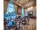 Elegant lounge space featuring fireplace, dining tables and comfortable seating, perfect for relaxation at 2777 Paradise Rd # 2701, Las Vegas, NV 89109