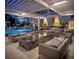 Inviting pool area featuring comfortable lounge seating, a fire feature, and stylish architecture for relaxation at 2777 Paradise Rd # 2701, Las Vegas, NV 89109